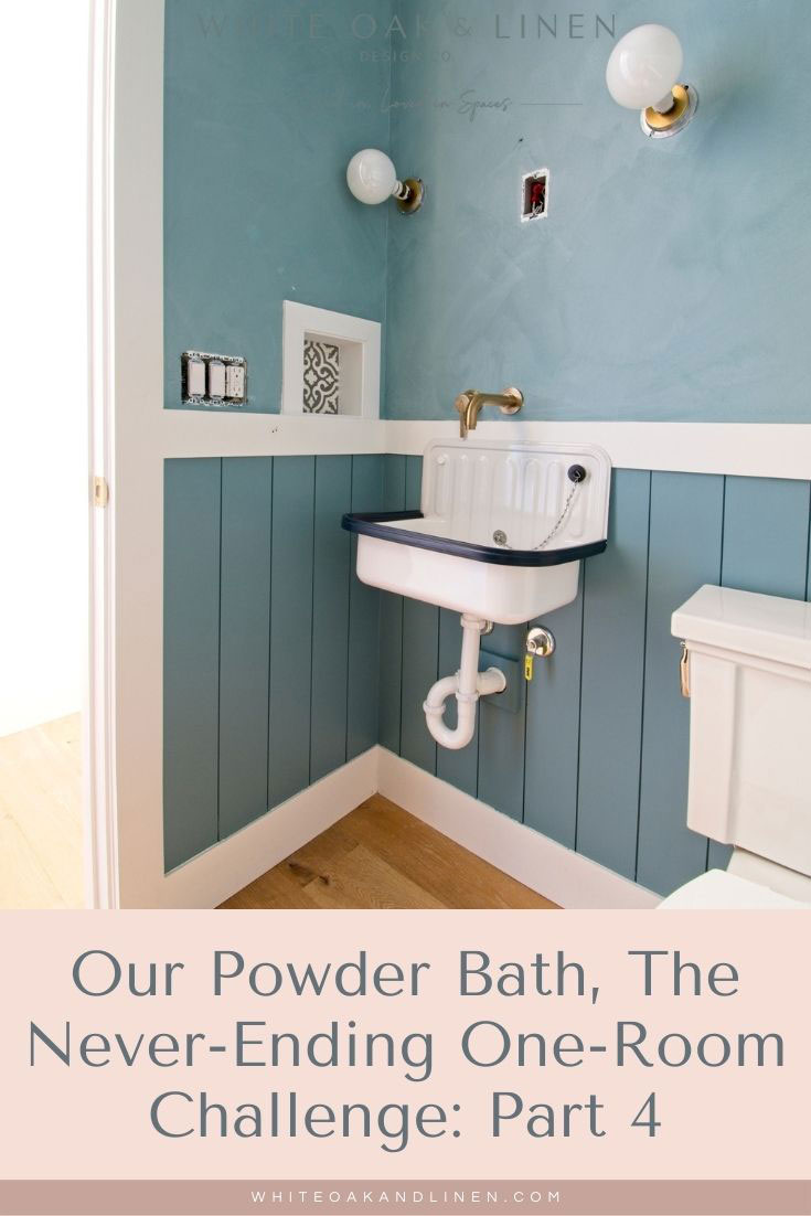 midtone blue powder bath with color wash lime wash walls and shiplap wainscoting antique reproduction bucket sink
